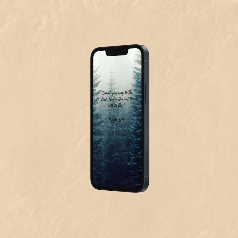 May include: A black smartphone displaying a forest scene with the text "Commit your way to the Lord: Trust in Him and He will do this." and "Psalm 37:5" in white. The phone has a sleek, modern design.