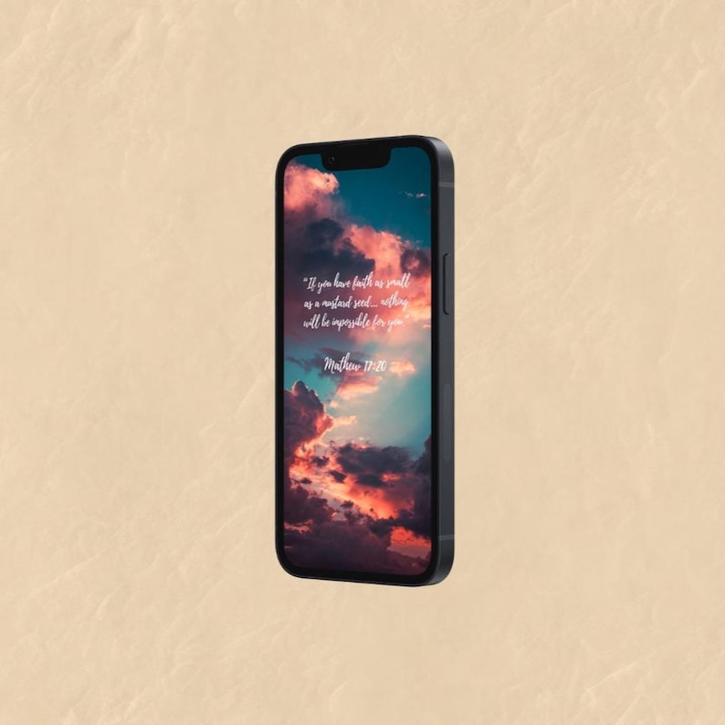 May include: A black smartphone displays a vibrant wallpaper of a cloudy sky with shades of orange, pink, and blue. The screen features the text "If you have faith as small as a mustard seed... nothing will be impossible for you. Matthew 17:20."