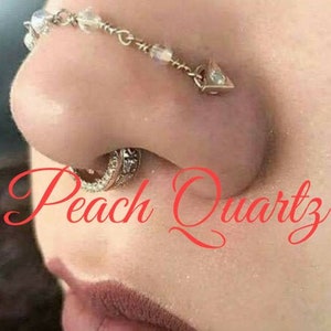 Handmade over the nose bridge double piercing chain with small peach quartz gemstones. Beads are 1.5 mm and peachy pink with sparkling facets. Ends are 3 mm jump rings. Metal choices: Silver or Gold Plated, Sterling Silver, and 14K Gold.
