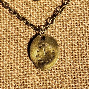 Salvador Dali Melting Clock Necklace: The Persistence of Memory Oval Gold or Silver Plated Gunmetal or Bronze Stamped Roman Numeral Pendant image 2