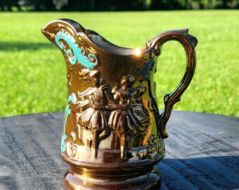 Antik kanna i koppar, lystergods med dansande par, 1830-1850-tal