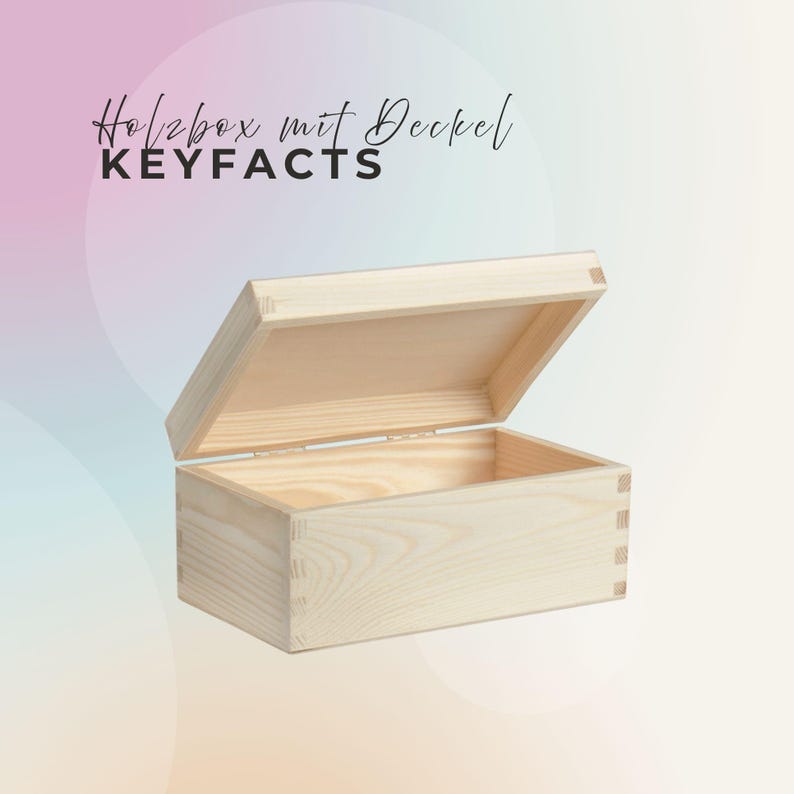 May include: An open, rectangular wooden box with a hinged lid. The box is made of light-colored wood and has dovetail joints. The text "KEYFACTS" is printed in black letters above the box.