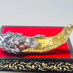 Leklai Tiger Fang Amulet: Golden, Silver & Red Mystic Wealth Talisman