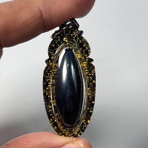 Black Leklai Amulet Pendant: Sacred Thai Talisman for Luck & Protection