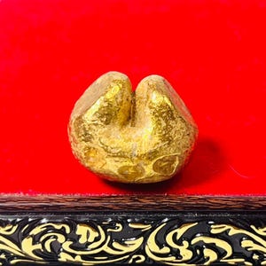 Golden Leklai Amulet: Wealth, Protection, and Charm - Buffalo Mountain Cave