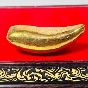 Golden Leklai Amulet: Naga Fang, Wealth & Protection, Buffalo Mountain Cave