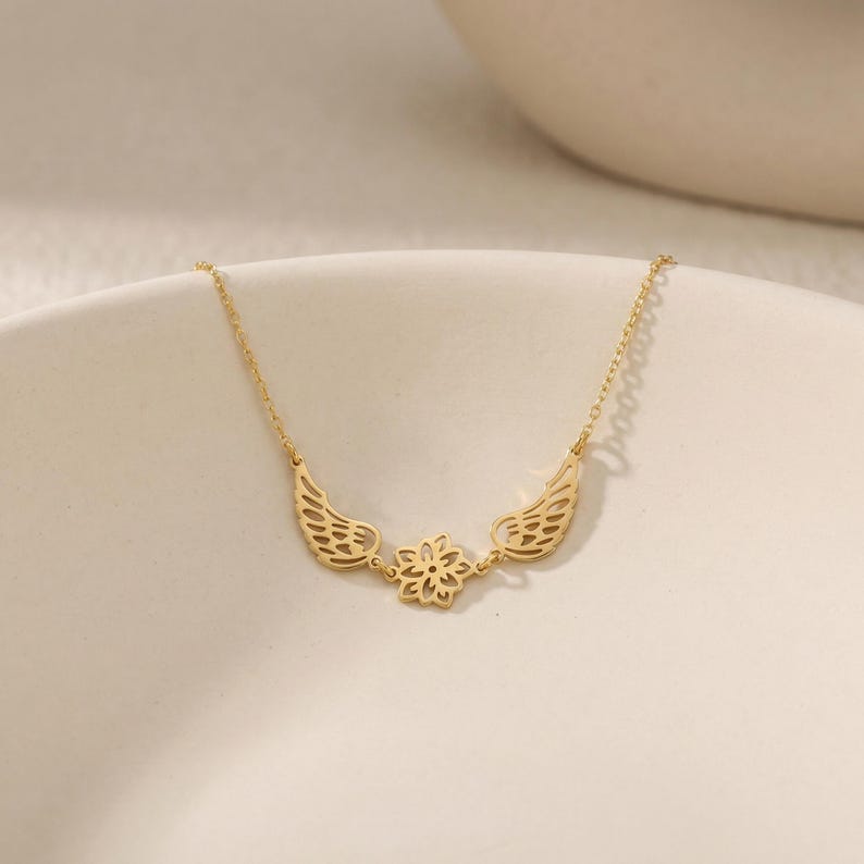 May include: A set of three ceramic mugs with a speckled, matte finish. The mugs are in shades of cream, light gray, and dark gray. Each mug has a simple, minimalist design, perfect for coffee or tea.