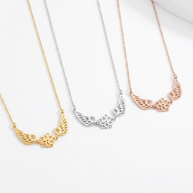 May include: A set of three ceramic mugs with a speckled, matte finish. The mugs are in shades of cream, light gray, and dark gray. Each mug has a simple, minimalist design and a rounded handle.