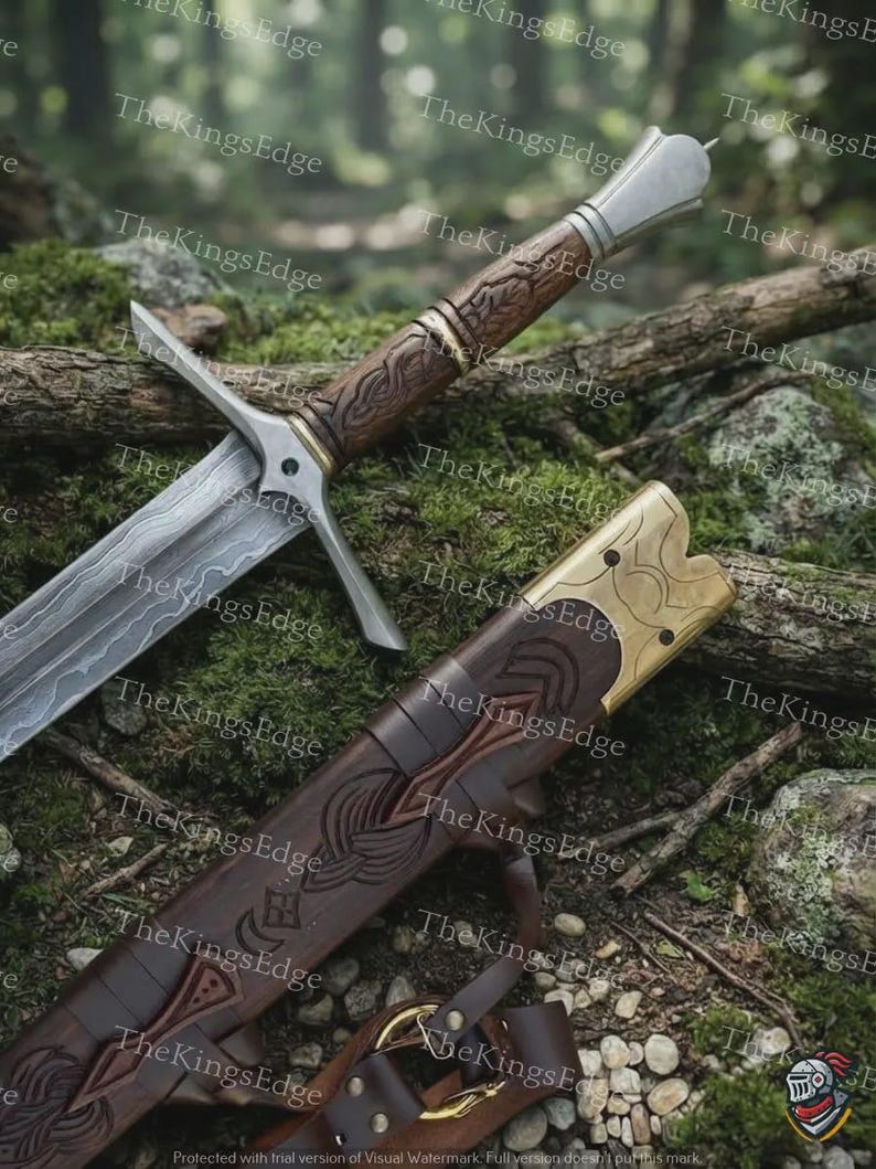 May include: A sword with a patterned steel blade, a brown carved wooden handle, and a silver pommel. Beside it lies a matching brown wooden scabbard featuring intricate carvings and a brass-colored metal throat piece with a leather strap.