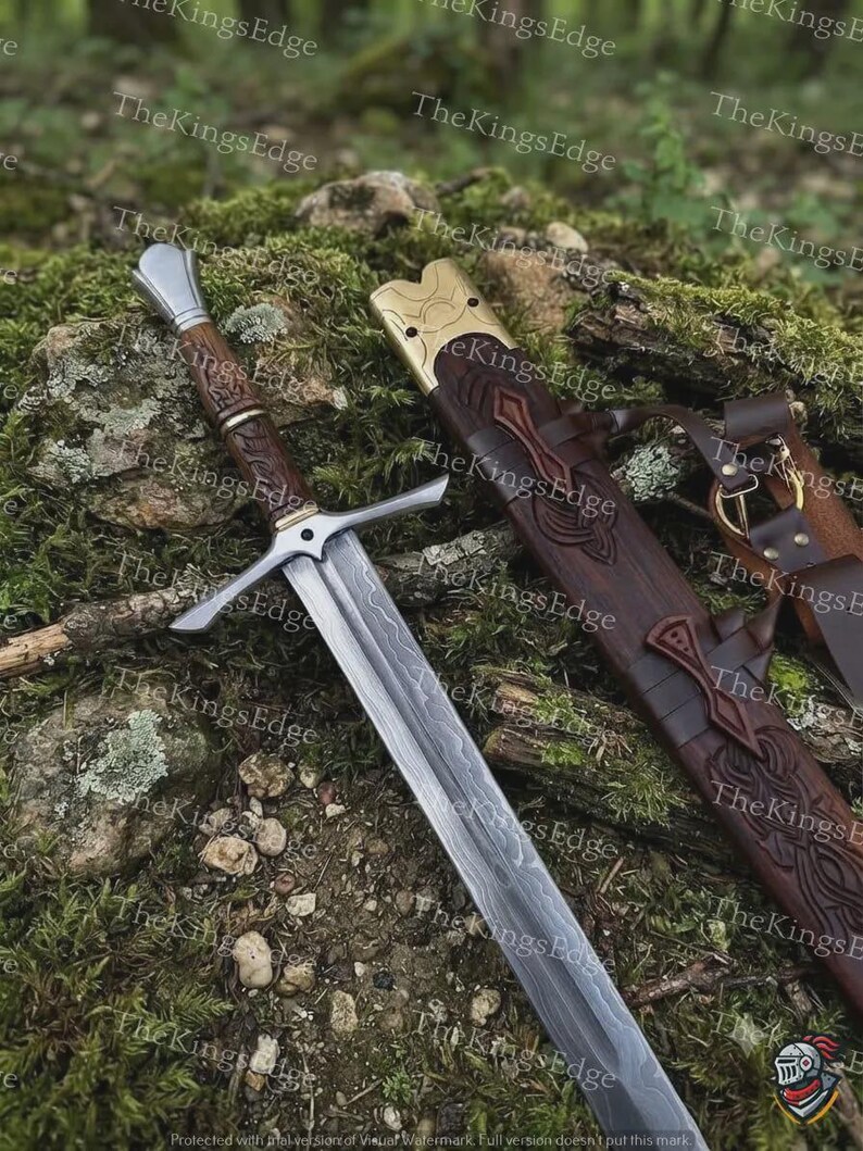 May include: A steel sword with a patterned blade, a brown wooden grip, and a silver crossguard. Beside it lies a matching brown wooden scabbard featuring intricate carvings, a brass-colored metal throat, and leather straps with metal rings.