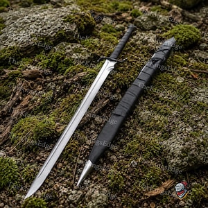 May include: A double-edged steel sword with a pointed tip, a central fuller, and a black wrapped handle with a curved crossguard. Beside the sword lies a matching black scabbard featuring a pointed metal chape and a black leather-wrapped exterior.