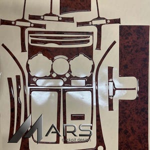 Op de afbeelding: Een set stickers voor het interieur met een donkerbruin houtnerfpatroon voor het dashboard en de middenconsole van een voertuig. De zelfklevende onderdelen hebben diverse geometrische vormen en uitsparingen. De tekst MARS cockpit design is zichtbaar.