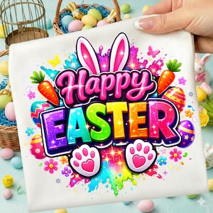 May include: A white Easter-themed design featuring the words "Happy Easter" in vibrant, multi-colored lettering. The design includes bunny ears, carrots, Easter eggs, and paw prints, all set against a colorful splash background.