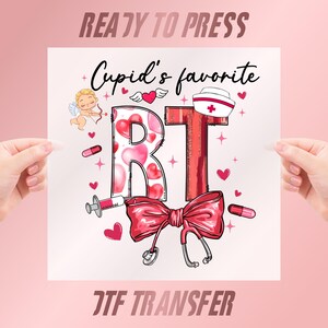 May include: A Valentine's Day themed design featuring the text "Cupid's favorite RT" with a nurse's hat, bow, stethoscope, and hearts. The design includes a syringe, pills, and an illustration of Cupid.
