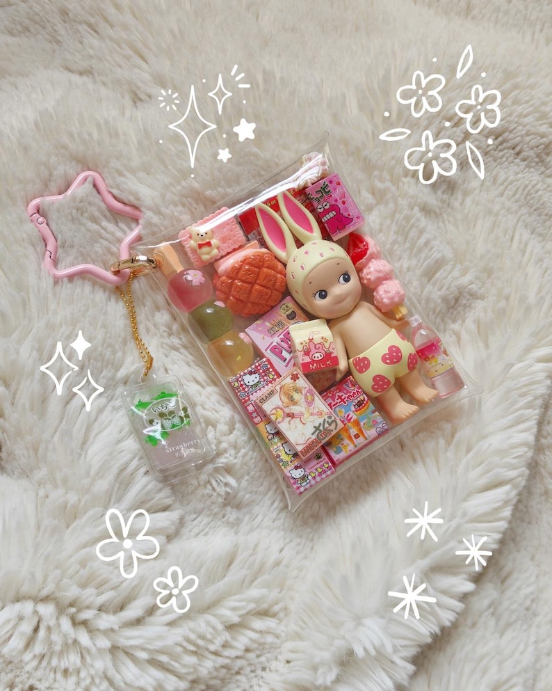 May include: A set of three ceramic mugs with a speckled, matte finish in cream, light grey, and dark grey. Each mug has a simple, minimalist design and a rounded handle. Ideal for tea or coffee.