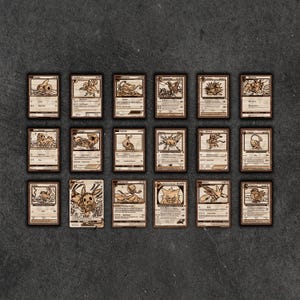 May include: Eighteen wooden trading cards, each depicting a different Pok&eacute;mon character. The cards are light brown with black text and illustrations. They are arranged in a grid pattern on a dark grey surface.