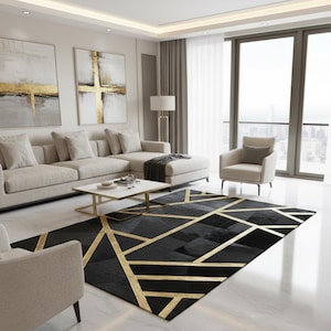 May include: A modern living room featuring a large black rug with gold geometric patterns. The room includes a beige sectional sofa, two abstract paintings with gold accents, and a white coffee table. A large window offers a city view.