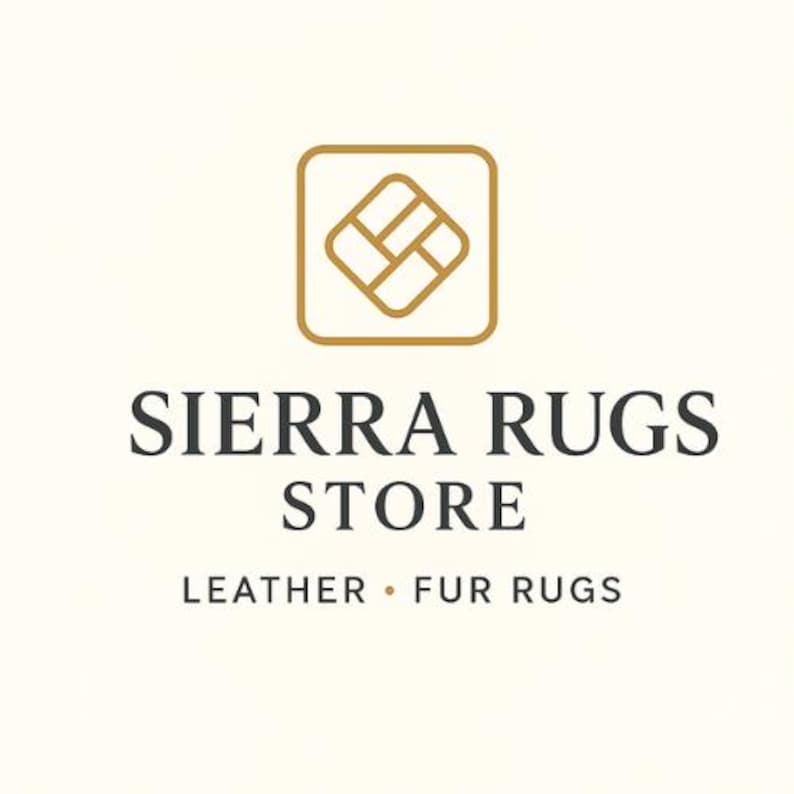 May include: Logo for Sierra Rugs Store, featuring a gold square icon with an abstract design. The store name is in a dark gray font, with the tagline "Leather &bull; Fur Rugs" below.
