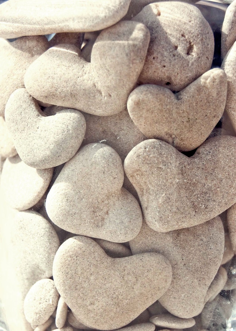 Heart shaped stones collected from the shore of the Mediterranean Sea - a beautiful keepsake for yourself or for the perfect gift of love. #heartshape #heartstones #valentinesday