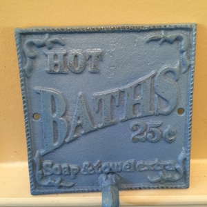Cast Iron "Hot Baths" Sign: Rustic Blue Wall Decor