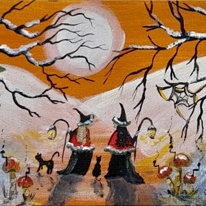 May include: Acrylic painting of two witches in black robes and hats, each holding a lantern, walking with black cats. The background features an orange sky, a full moon, and bare tree branches. Mushrooms and a spider web are also visible.