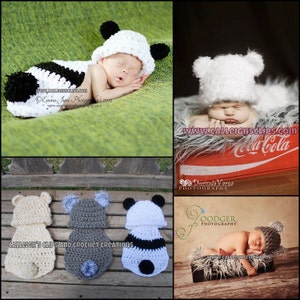 May include: Three crocheted baby outfits in the shapes of a panda, bear, and koala. The outfits are white, gray, and black with black accents. The outfits are laid out on a wooden surface.