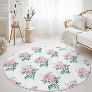 Rond vloerkleed met bloemmotief, elegant bloemdessin, botanisch rond tapijt voor woonkamer, zacht bloemendecor, woonaccent