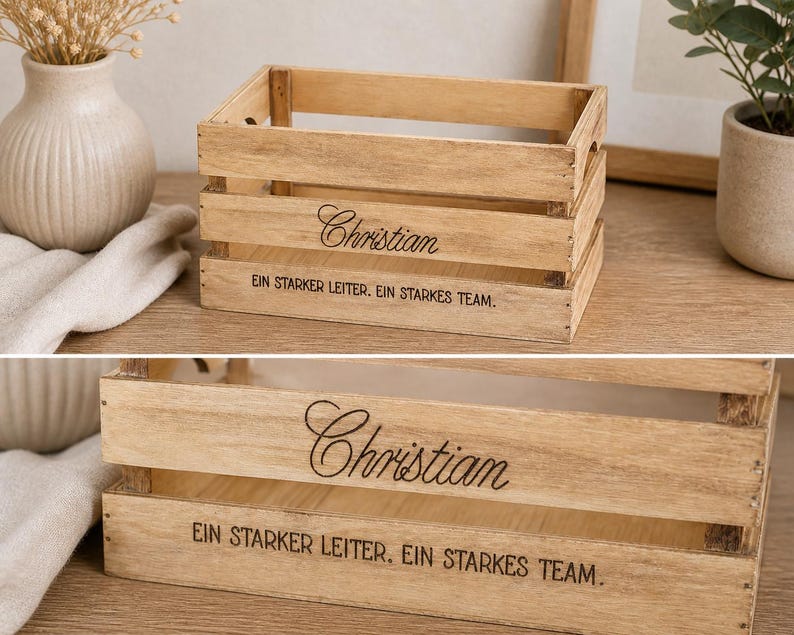 May include: A rectangular light brown wooden crate with horizontal slats. The front panel features the name Christian in a cursive script font, followed by the text EIN STARKER LEITER. EIN STARKES TEAM. printed in a simple sans-serif font.