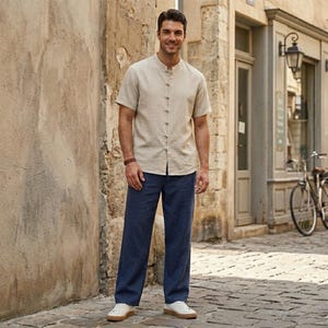 Rustic men’s boho shirt in linen-look Tencel fabric, styled for vacation, LARP, and medieval fair outfits.