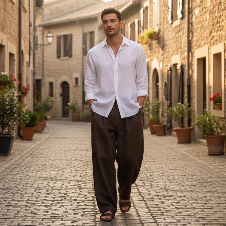 Brown linen pants outfit with beige tee, casual café scene – men’s breathable minimalist trousers