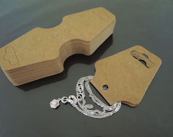 100pcs Fold Over Kraft Hang Tag pour collier, bracelet, queue de cheval, bande de cheveux, élastique, affichage de bijoux et fournitures