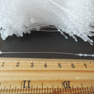 1000pcs Clear White Snap Lock Tag String Clothing Tag String Hang Tag String 80mm image 3