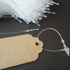 1000pcs Clear White Snap Lock Tag String Clothing Tag String Hang Tag String 80mm image 4