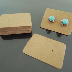 100pcs Orecchino Kraft Carta Tag - Kraft Tags Orecchino Tag Prezzo Tag Marrone Tag Plain Tags con due fori 2,5 cm x 3,5 cm