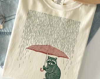 Raccoon Retro Graphic T-shirt, Vintage Comfort Colors Raccoon in Rain Tshirt, Raccoon Lovers, Funny Raccon Tee, Unisex Oversized Washed Tee