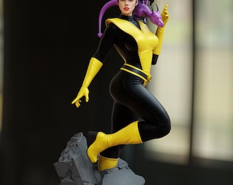 May include: A detailed figurine of a female character in a black and yellow costume, posed dynamically on a rocky base. The figure has a purple dragon-like creature on her shoulder. The base is black with yellow and red accents.