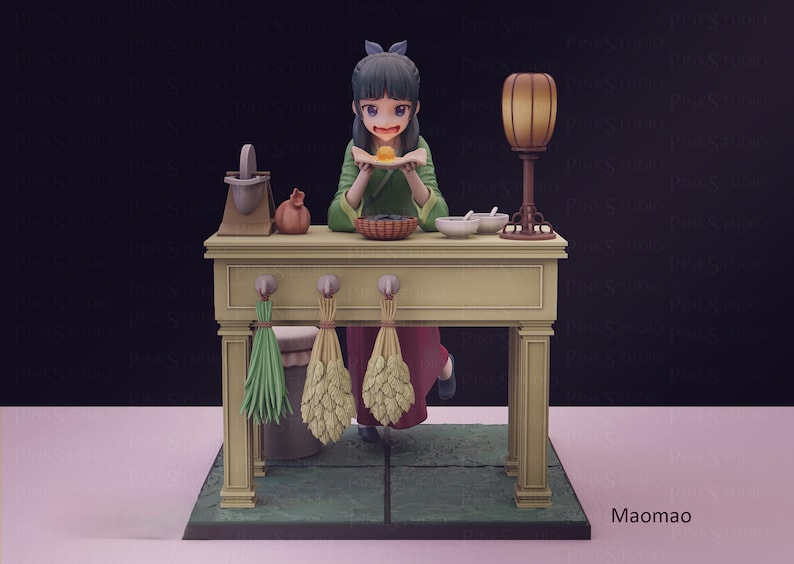 May include: A detailed figurine of a character in a green outfit, holding a small object. The figure is behind a table with various items, including bowls, a lamp, and hanging bundles. The base is green with the text "Maomao".