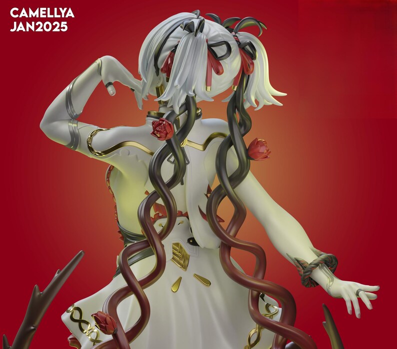 May include: A white figurine with a flowing dress and long, curly black and red vines. The figurine has white hair with red accents and is adorned with red roses. The text "CAMELLYA JAN2025" is in the upper left corner.