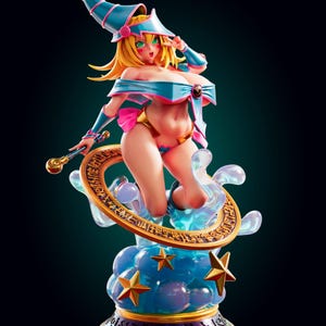 May include: A blonde anime-style figurine wearing a blue hat and matching top with pink accents, holding a gold wand. The figure stands on a base featuring a gold ring with etched symbols, blue translucent clouds, and gold stars against a dark background.