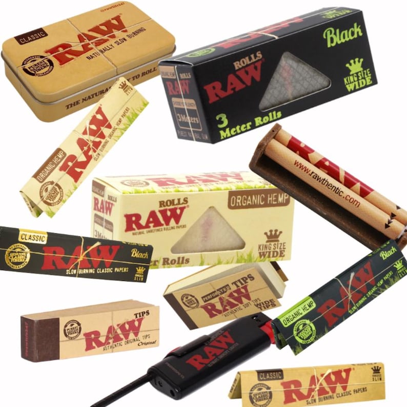 May include: An assortment of RAW brand rolling papers, tips, and accessories. The image features various boxes and packs of rolling papers, including organic hemp and classic varieties, along with a metal tin and a lighter. The products are in shades of brown, black, and white.