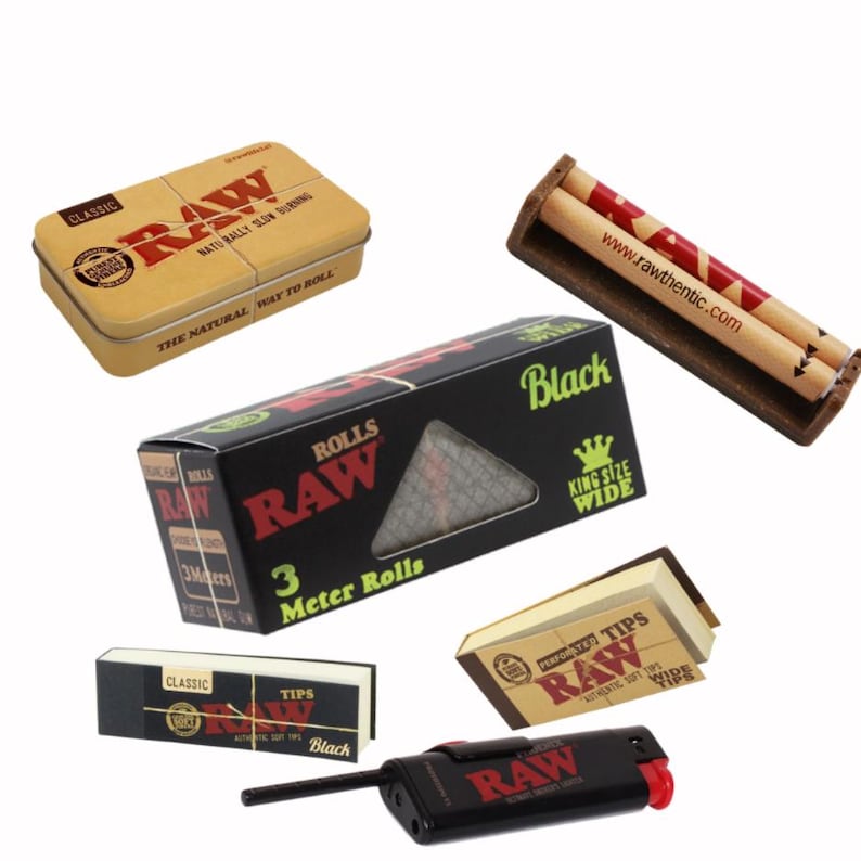 May include: An assortment of RAW brand smoking accessories, including a metal tin, rolling papers, a rolling machine, filter tips, and a lighter. The products feature the RAW logo in red and black on a white background.