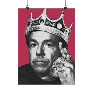 May include: Black and white poster print of a man wearing a silver crown and multiple rings. The background is a solid red color. The man is looking directly at the viewer.
