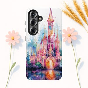 May include: A phone case featuring a watercolor painting of a fairytale castle with pink, purple, and blue hues. The castle is reflected in the water below, with a white background. The case has a camera module on the top left.