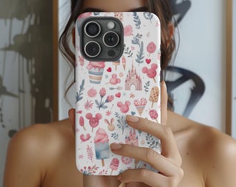 May include: White phone case with a whimsical pattern featuring pink and blue illustrations of castles, ice cream, Mickey Mouse heads, and floral elements. The case has a glossy finish and a camera cutout.
