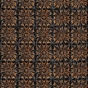 Puede incluir: Un patrón repetitivo de flores de madera talladas con un fondo marrón oscuro y centros naranjas.