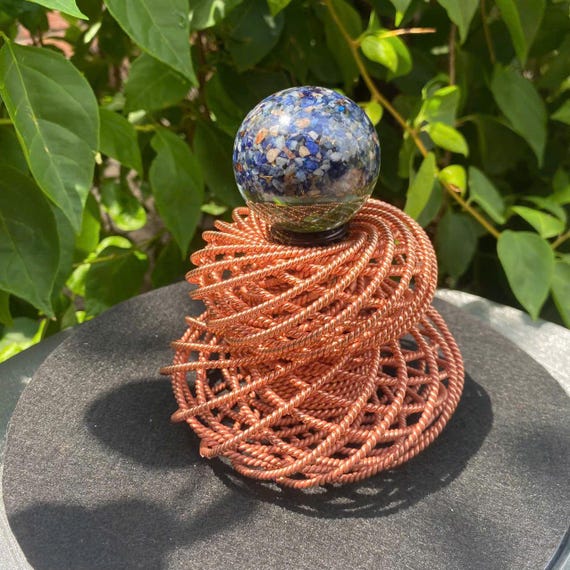 A set of two Torus devices with accompanying energy stones. Torus 177mhz 432mhz