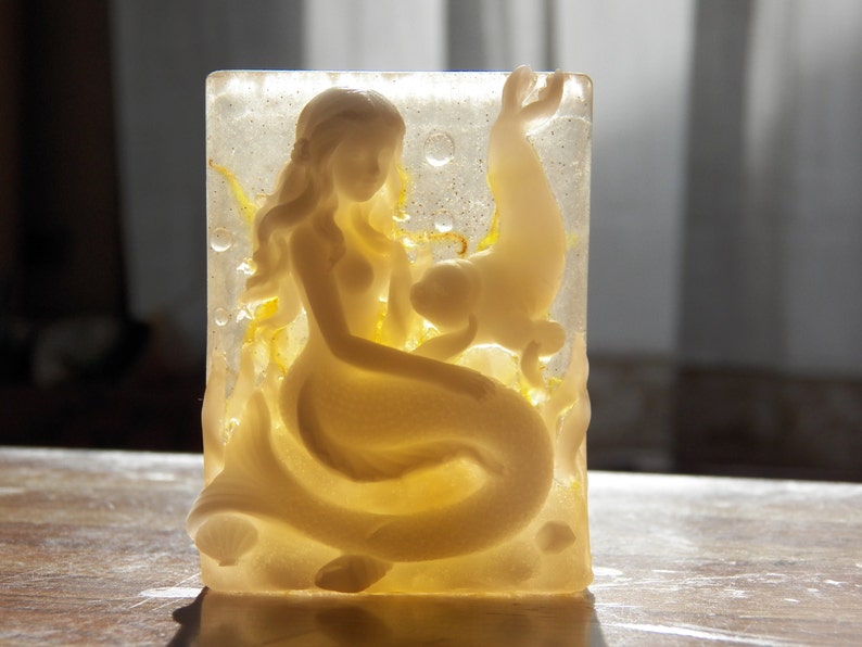 gorgeous mermaid and seal calendula honey soap handmade soaps sea soaps flower petals botanicals honey soap ocean sea florals deep sea life image 1