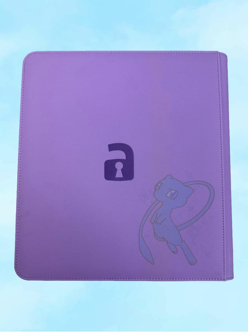 May include: A purple binder with a keyhole graphic and a cartoon character illustration. The binder has a stitched border and a light blue background.