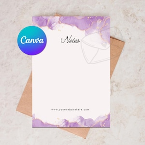 May include: A notepad featuring a purple and gold watercolour design. The word "Notes" is written in black script. The Canva logo is in the upper left corner. The website address www.yourwebsitehere.com is at the bottom.