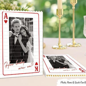 May include: A rectangular custom photo display designed like an Ace of Hearts playing card, featuring a black and white couple's portrait, a red brick pattern border, and the red script text How lucky are we? printed on the front surface.